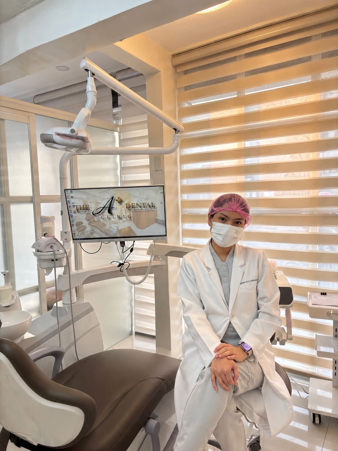 Dr. Aerish Joy D. Peñones wearing clinical protective equipment inside The A+ Dental Clinic